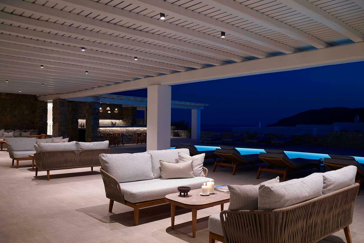 blue pearl outdoor area by night - mykonos villas